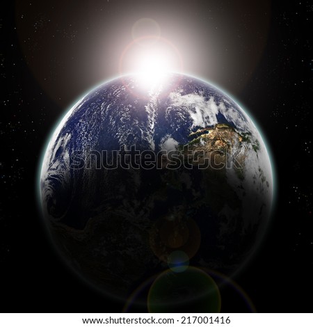 Earth seen from space at sun dawn and stars - Elements of this image furnished by NASA-