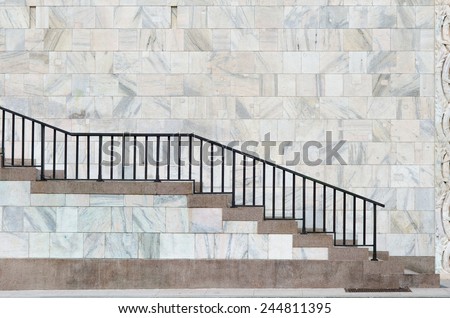 marble and red stone stair in milan near the cathedral and steel