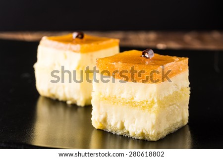 sweet baked tart with orange jam and butter cream