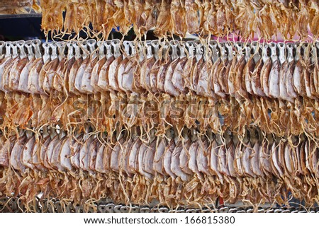 Selling dried squid, the food of Thailand