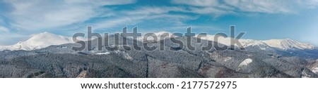 Picturesque winter mountain panorama view from Skupova mountain slope, Ukraine, view to Chornohora ridge and Pip Ivan mountain top with observatory building, Carpathian. Imagine de stoc © 
