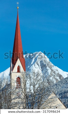 Haselgehr village and Catholic parish church St. Martin. Winter view (Austria, Tirol). 1689 a chapel was named in Martin Unterhof. 1704 took place a new building.