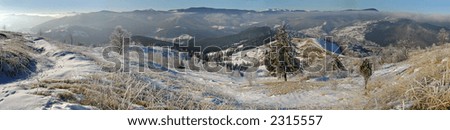 Winter panorama of mountain ridhe (Jaremcha resort outskirts, Ukraine, Carpathian Mt\'s)