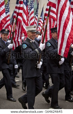NEW YORK, NY, USA - MAR 16:  NYFD at the St. Patrick\'s Day Parade on March 16, 2013 in New York City, United States.