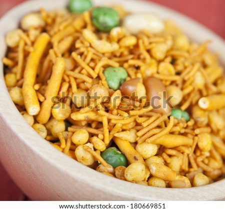 Fresh Chanachur or bombay mix in a wooden bowl