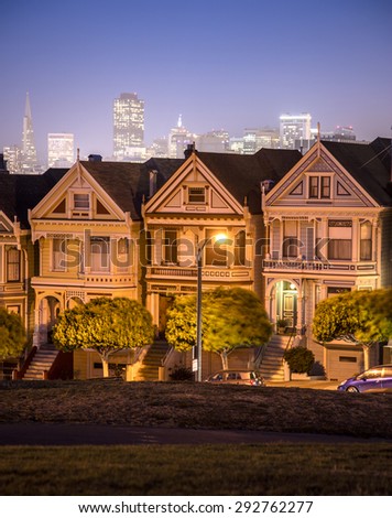 The Painted Ladies of San Francisco at sunset with downtown background