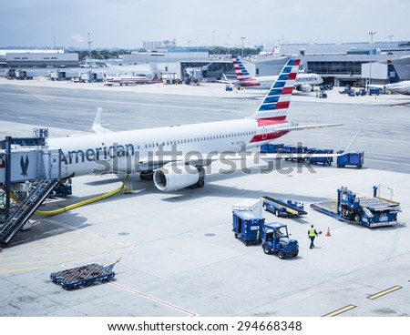 New York, USA - June 19th, 2015: American Airlines passenger jet being loaded at JFK airport in New York.