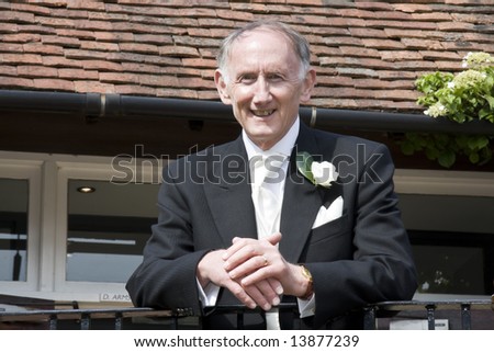 Senior man in traditional wedding morning suit