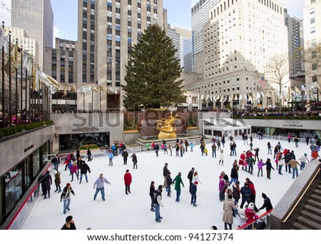 NEW YORK CITY - December 17: People enjoying Rockefeller Center Ice Skating at Christmas with the famous Christmas tree on December 17th, 2011 in New York City, New York.