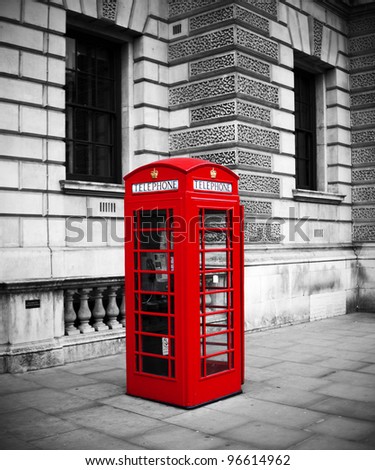 Traditional old style UK red phone box in London.