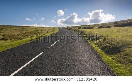 The road to freedom ? An open road in Dartmoor, Devon - England.