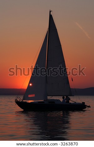 Sunset and boat with people 2.