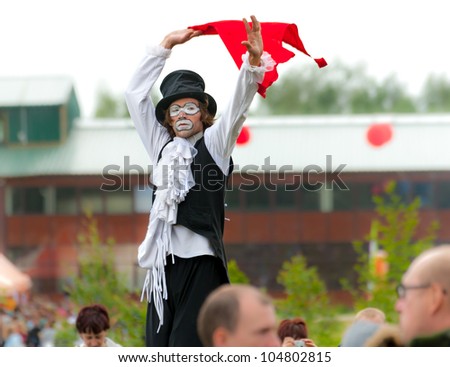 ETNOMIR, RUSSIA - JUNE 2: Unidentified clown having fun on open-air international ethnic music \