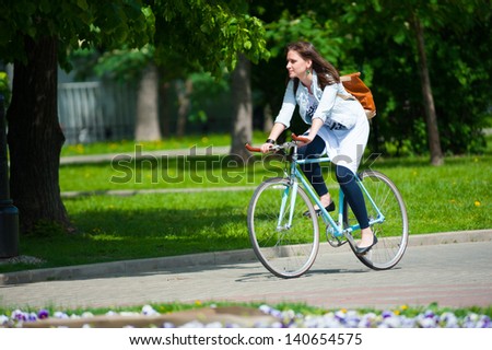 MOSCOW - MAY 19: Cyclist rides during the Day of the Uniform Bike Action on May 19, 2013 in Moscow. During this event many cyclists ride bicycles in an unusual wear and took part in the flash mobs