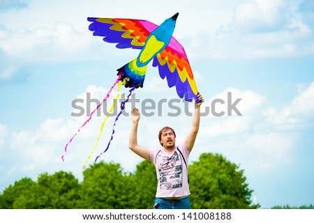 MOSCOW - MAY 25: Unidentified people fly kites at the kite festival in the park Tsaritsyno on May 25, 2013 in Moscow.