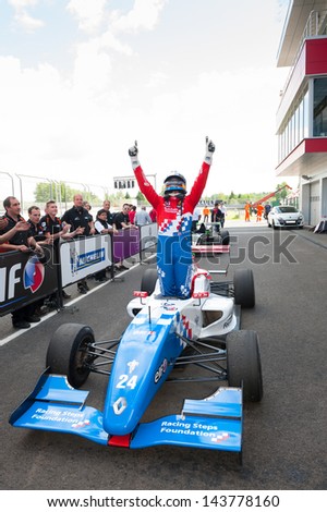 MOSCOW - JUNE 23: Oliver Rowland of Manor MP Motorsport team (NED) finish first at Formula Renault 2.0 race at World Series by Renault in Moscow Raceway on June 23, 2013 in Moscow