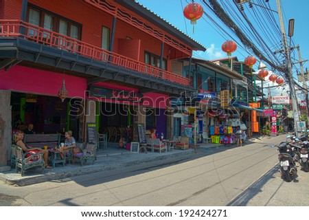 SAMUI, THAILAND - MARCH 29: Typical street with many shops and cafes for tourists at day time on March 29, 2014 in Samui, Thailand.