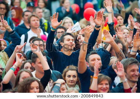 MOSCOW - JUNE 15: People cheering at open-air concert on XI International Jazz Festival 