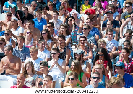 MOSCOW - JULY 26: People cheering at Moscow City Games in Luzhniki on July 26, 2014 in Moscow.