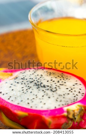 Thai desert orange juice and half of pitaya fruit