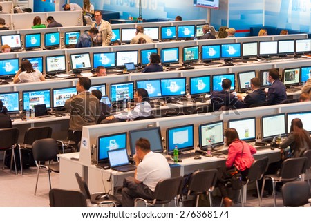 MOSCOW - MAY 9: Journalists work in the international press center, they write news about 70th anniversary of the victory in the Second World War events on May 9, 2015 in Moscow