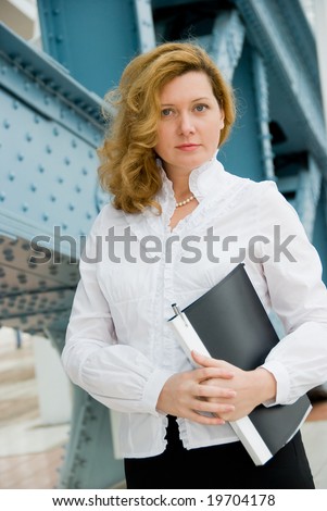 Middle age business woman portrait in downtown