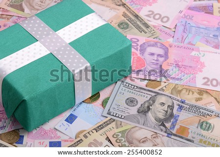 american money and green gift box, european money