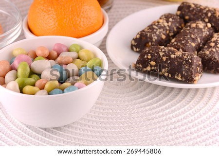 candies and fruits, sweet cake and tasty lemon