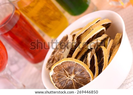 old fruits on white plate and juice close up