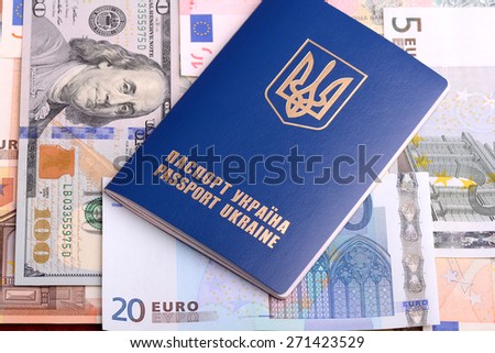 ukrainian passport with euro notes and american dollars