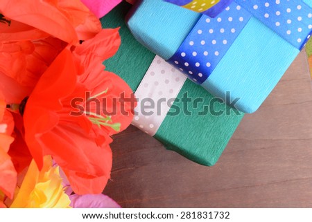Sweet color flowers from mulberry paper with holiday gift box