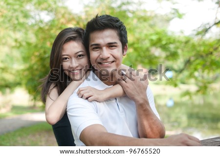 https://image.shutterstock.com/display_pic_with_logo/796264/96765520/stock-photo-attractive-asian-couple-spending-time-together-in-the-park-96765520.jpg
