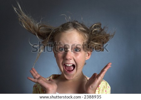 girl with hair blowing up