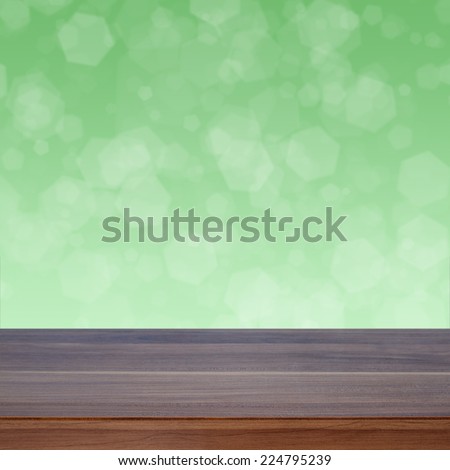 Empty wooden deck table with bokeh background. Ready for product display montage