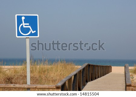 A wheelchair sign for easy access to the beach