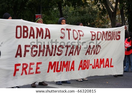 LISBON - NOVEMBER 20: Protesters call for the end of aggressions against Afghanistan and ask for the release of Mumia Abu-Jamal, during an anti-NATO demonstration, on November 29, 2010 in Lisbon.