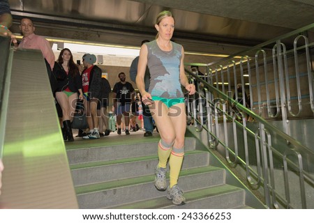 Los Angeles, CA - January 11, 2015: Woman without pants down the stairs during the 7th Annual International \