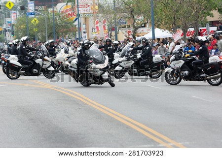 Canoga Park, CA, USA - May 25, 2015: Police Department motorcycle officers performing during Memorial Day Parade