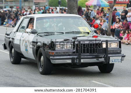 Canoga Park, CA, USA - May 25, 2015: Vintage police car during Memorial Day Parade