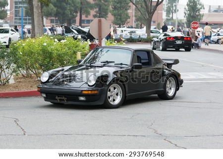 Woodland Hills, CA, USA - July 5, 2015: Porsche 911 car on display at the Supercar Sunday car event.