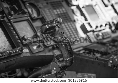 Helicopter control stick in side pilot cockpit