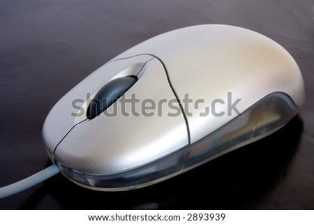grey PC mouse isolated on black