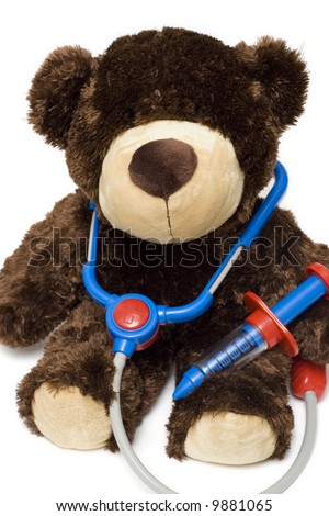 Doctor Teddy Bear With Medical Stethoscope And Syringe Stock Photo ...