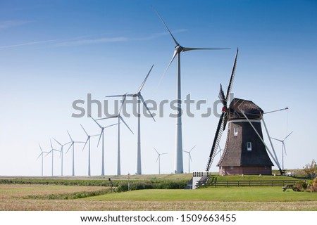 Similar – Image, Stock Photo Wind turbine against blue sky. Wind power energy concept