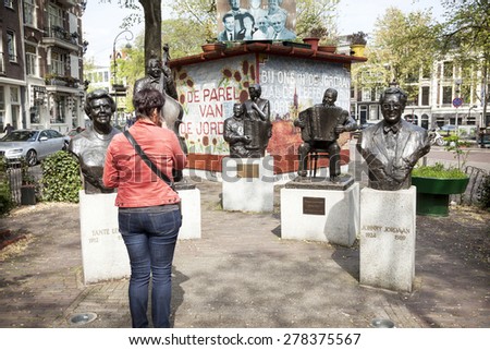 Amsterdam, Netherlands, 10 May 2015: statues in bronze of famous artists from the Jordaan in Dutch capital Amsterdam