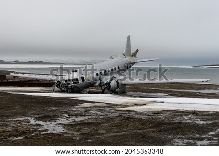 Wreck of soviet military plane Ilyushin Il-14 which crashed at Heiss Island, Franz Jozef Land archipelago.  Photo stock © 