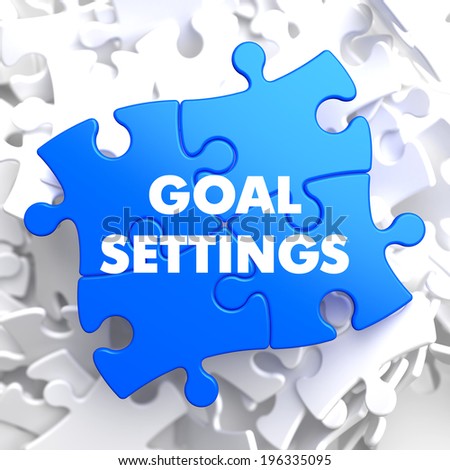 Goal Settings on Blue Puzzle on White Background.