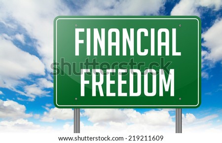 Highway Signpost with Financial Freedom wording on Sky Background.