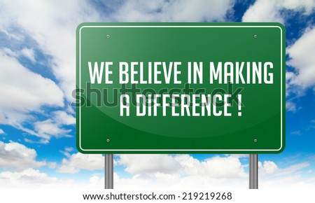 Highway Signpost with We Believe in Making a Difference wording on Sky Background.