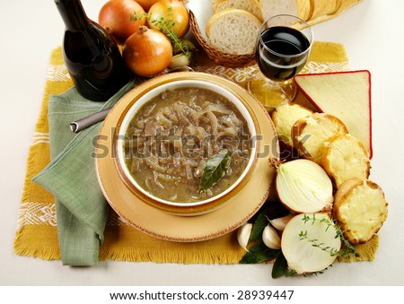 French onion soup with cheese and cheddar rounds ready to serve.